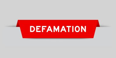 Red color inserted label with word defamation on gray background clipart