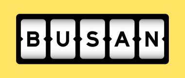 Sarı arkaplanlı slot pankartımızda busan sözcüğündeki siyah renk