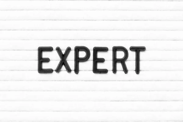 Black Color Letter Word Expert White Felt Board Background — Stock Photo, Image