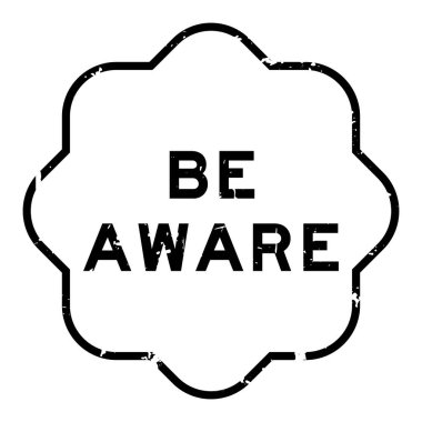 Grunge siyah arka planda lastik mühür sözcüğünün farkında ol