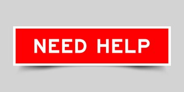 Kare etiketi ile kelime gri arkaplan üzerinde kırmızı renk yardıma ihtiyacı var