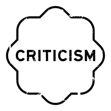 Grunge siyah eleştiri kelimesi arka planda kauçuk mühür