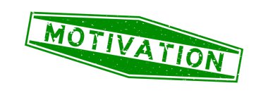 Grunge yeşil motivasyon kelimesi altıgen lastik mühür beyaz arka planda