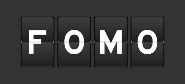 Gri arkaplanda FOMO sözcüğüyle siyah renk analog çevirme tahtası (kaçırılma korkusu kısaltması)