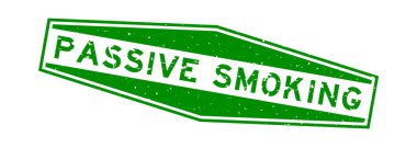 Grunge yeşil pasif tüten kelime altıgen lastik mühür beyaz arka planda