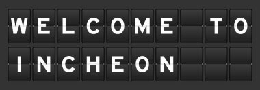 Kelime ile siyah renk analog çevirme tahtası Gri arkaplanda incheon hoş geldiniz