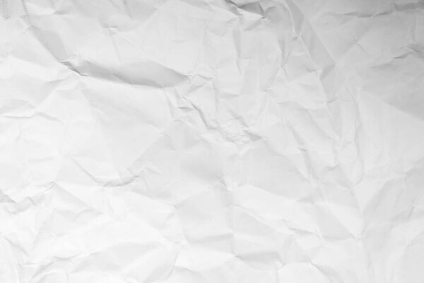 Grunge wrinkled white color paper textured background with copy space. Use for decoration or layer