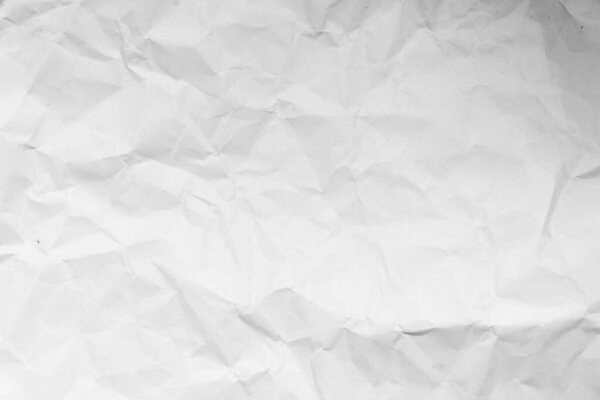 Grunge wrinkled white color paper textured background with copy space. Use for decoration or layer