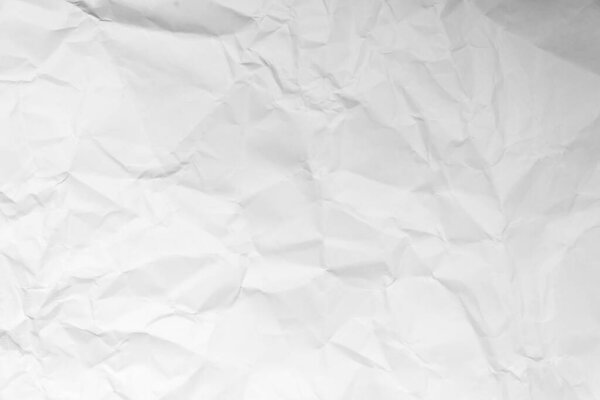 Grunge wrinkled white color paper textured background with copy space. Use for decoration or layer