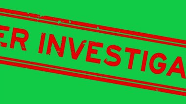 Grunge kırmızı soruşturma altında kelime kare lastik mühür yeşil arka planda yakınlaştırma