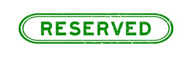 Grunge green reserved word rubber seal stamp on white background