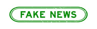 Grunge yeşil sahte haber sözcüğü beyaz arka planda lastik mühür