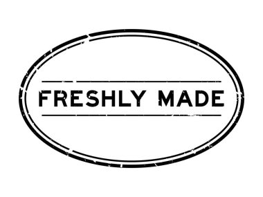 Grunge, beyaz arka planda yeni yapılmış oval lastik mühür mührü.