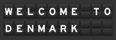 Kelime ile siyah renk analog çevirme tahtası gri arka planda Danimarka 'ya hoş geldiniz