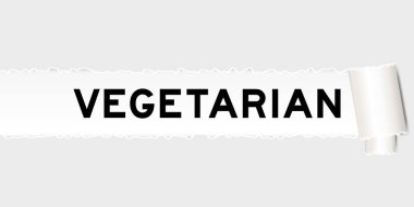 Yırtılmış gri kağıt arka planında yırtık parça halinde vejetaryen kelimesi var.