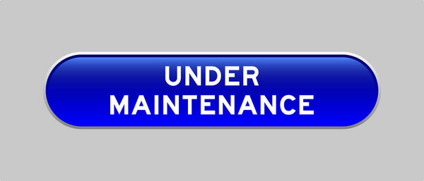 Кнопка формы капсулы голубого цвета с надписью на заднем плане