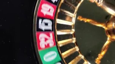 The roulette wheel in the casino is spinning - 7 red wins