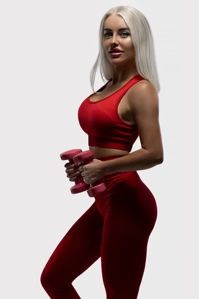 Hermosa Modelo Fitness Rubia Bronceada Posando Leggings Rojos Una Parte —  Fotos de Stock