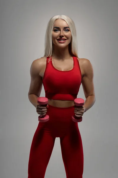 Beautiful Tanned Blonde Fitness Model Posing Red Leggings Top Dumbbells — Stock Photo, Image