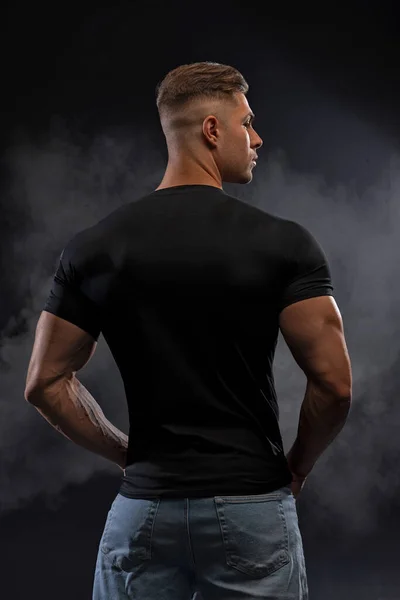 Muscular Model Sports Young Man Jeans Black Shirt Black Background — Stock Photo, Image