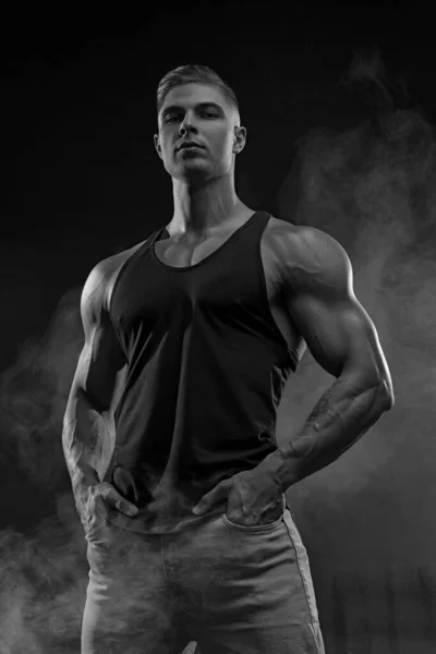 Muscular Model Sports Young Man Jeans Black Shirt Black Background — Stock Photo, Image