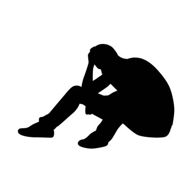 Üzgün bir adam oturur ve kafasını tutar, bir şey için endişelenir, üzgün, mutsuz ya da hayal kırıklığına uğratır yalnız ağlar.