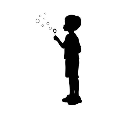 Little boy blowing to make many bubbles, boy plays with soap bubbles silhouette