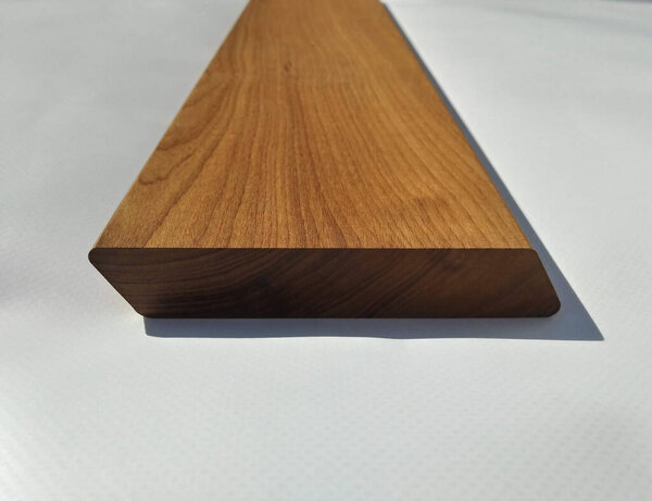 Facade board made of ash, thermal wood for cladding the building.