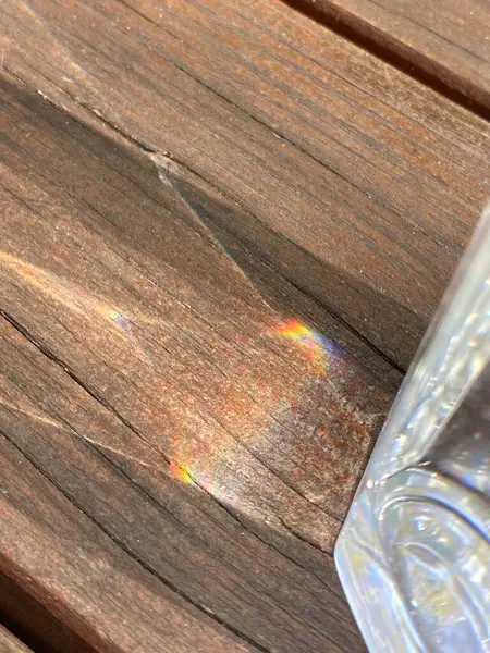 stock image Glass of water on a wooden table, close-up, macro