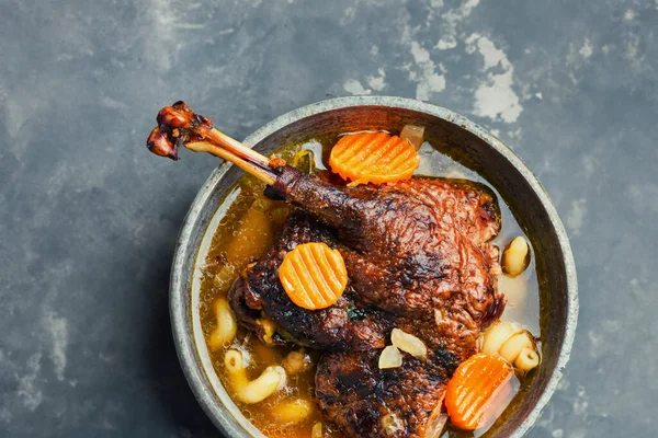 Aromatic goose leg soup with pasta