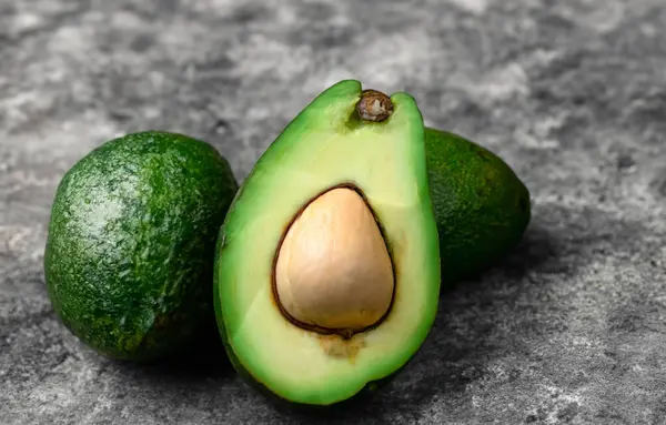 Avocado Halves Wooden Background — Stock Photo, Image