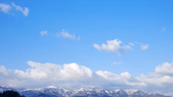 stock image a beautiful landscape with a blue sky and mountains. high quality photo