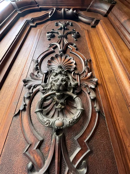 stock image bronze doorknob with lion's head and floral motifs. High quality photo