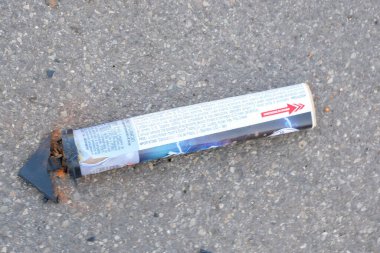 leftovers from the end of the year fireworks left on the street litter. High quality photo