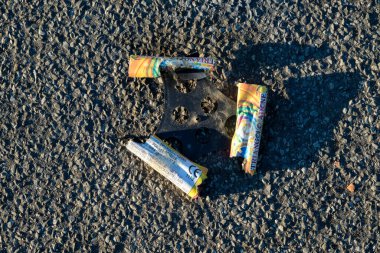 leftovers from the end of the year fireworks left on the street litter. High quality photo