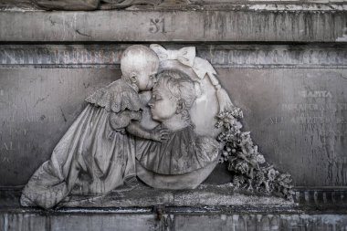 old statue of little girl in abandoned cemetery. High quality photo