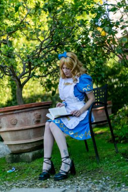 Lucca, Italy - 2018 10 31 : Lucca Comics free cosplay event around city Alice in Wonderland. High quality photo