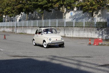 Bibbiano-Reggio Emilia Italy - 07 15 2015 : Free rally of vintage cars in the town square white Fiat 500. High quality photo