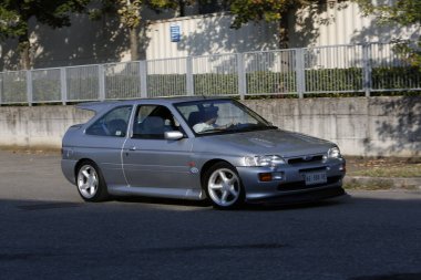 Bibbiano-Reggio Emilia Italy - 07 15 2015 : Free rally of vintage cars in the town square Ford Escort Rs Cosworth. High quality photo