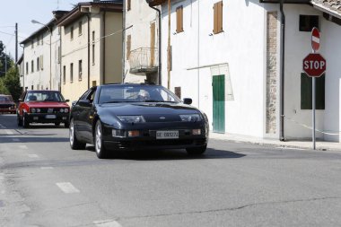 Bibbiano-Reggio Emilia Italy - 07 15 2015 : Free rally of vintage cars in the town square Nissan zx 300. High quality photo