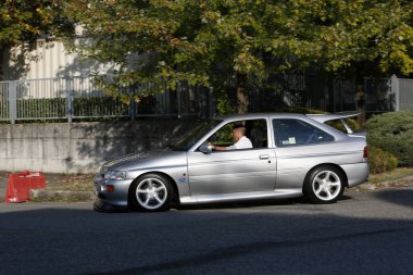 Bibbiano-Reggio Emilia Italy - 07 15 2015 : Free rally of vintage cars in the town square Ford Escort Rs Cosworth. High quality photo