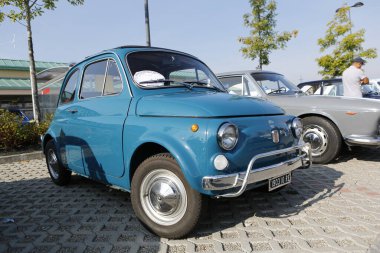 Bibbiano-Reggio Emilia Italy - 07 15 2015 : Free rally of vintage cars in the town square fiat 500 blue. High quality photo