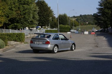 Bibbiano-Reggio Emilia Italy - 07 15 2015 : Free rally of vintage cars in the town square Ford Escort Rs Cosworth. High quality photo