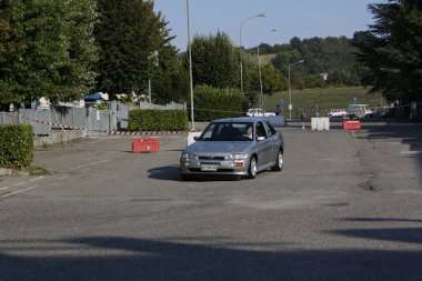 Bibbiano-Reggio Emilia Italy - 07 15 2015 : Free rally of vintage cars in the town square Ford Escort Rs Cosworth. High quality photo
