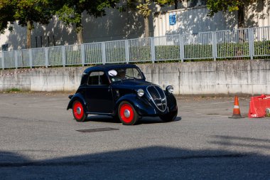 Bibbiano-Reggio Emilia Italy - 07 15 2015 : Free rally of vintage cars in the town square Fiat Topolino. High quality photo