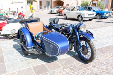 Bibbiano-Reggio Emilia Italy - 07 15 2015 : Free rally of vintage cars in the town square Bmw Sidecar. High quality photo