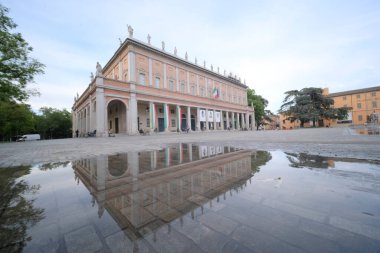 Reggio Emilia victory square bright colored fountains in front of the valli theater. High quality photo