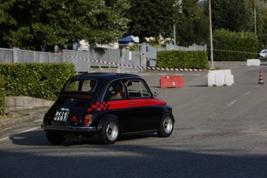 Bibbiano-Reggio Emilia Italy - 07 15 2015 : Free rally of vintage cars in the town square Fiat 500 black. High quality photo