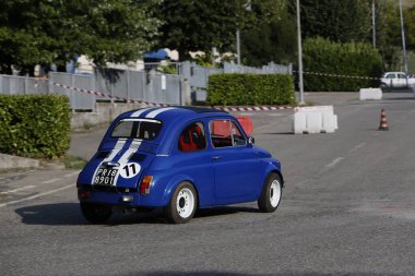 Bibbiano-Reggio Emilia Italy - 07 15 2015 : Free rally of vintage cars in the town square blue viper Fiat 500. High quality photo