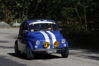 Bibbiano-Reggio Emilia Italy - 07 15 2015 : Free rally of vintage cars in the town square blue viper Fiat 500. High quality photo